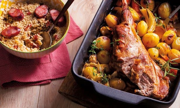 Cabrito assado com batata e arroz de...