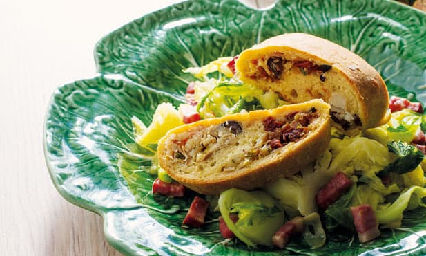 Pão de bacalhau com couves salteadas