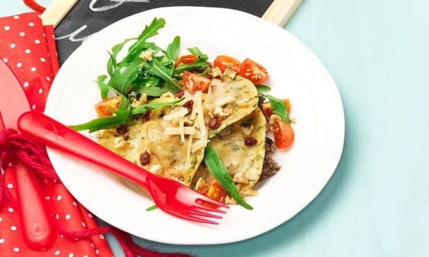 Ravioli com rúcula e cogumelos