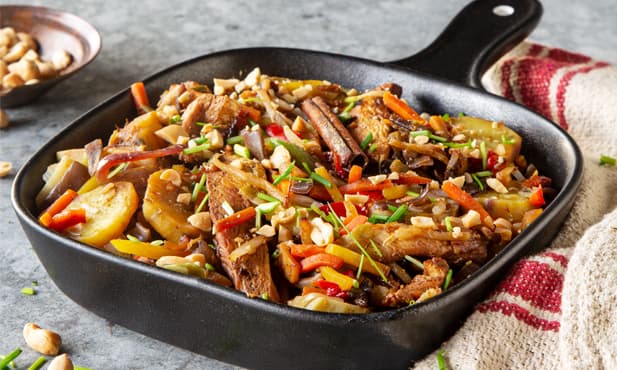 Frango salteado com vegetais e...